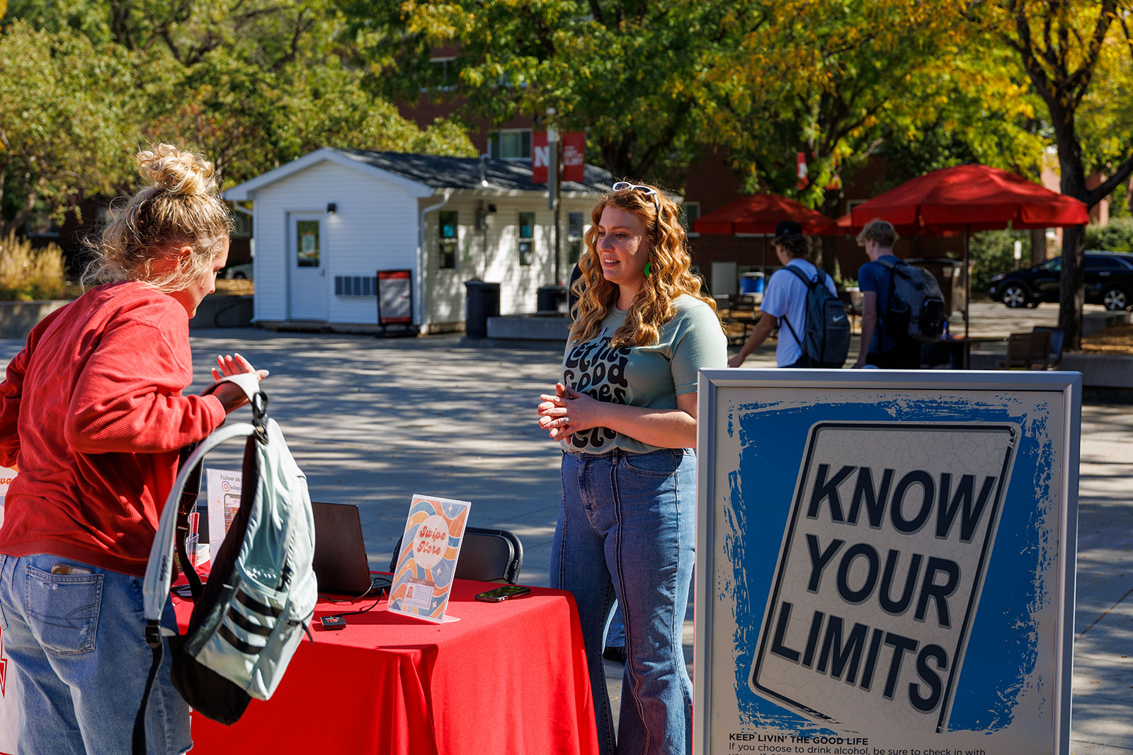 Staff offer alcohol education at tabling event on campus