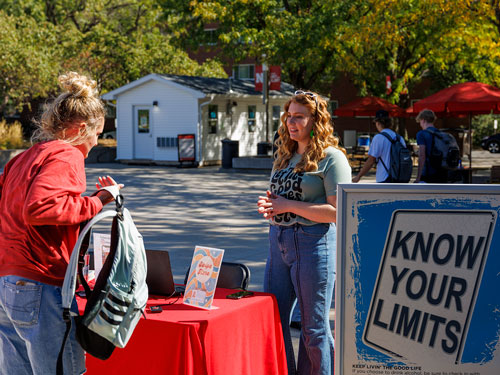 Staff offer alcohol education at tabling event on campus